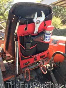 Husky tool holder on tractor becomes a tractor tool caddy.